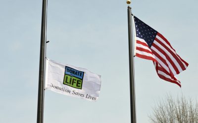 Trinity Health System to Honor Organ Donors with Annual Flag Raising and Pinwheel Garden During Donate Life Month